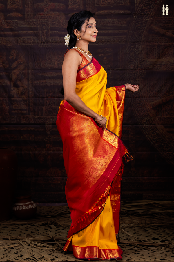 Kanchipuram Silk Saree In Honey Yellow With Peacock Buttas