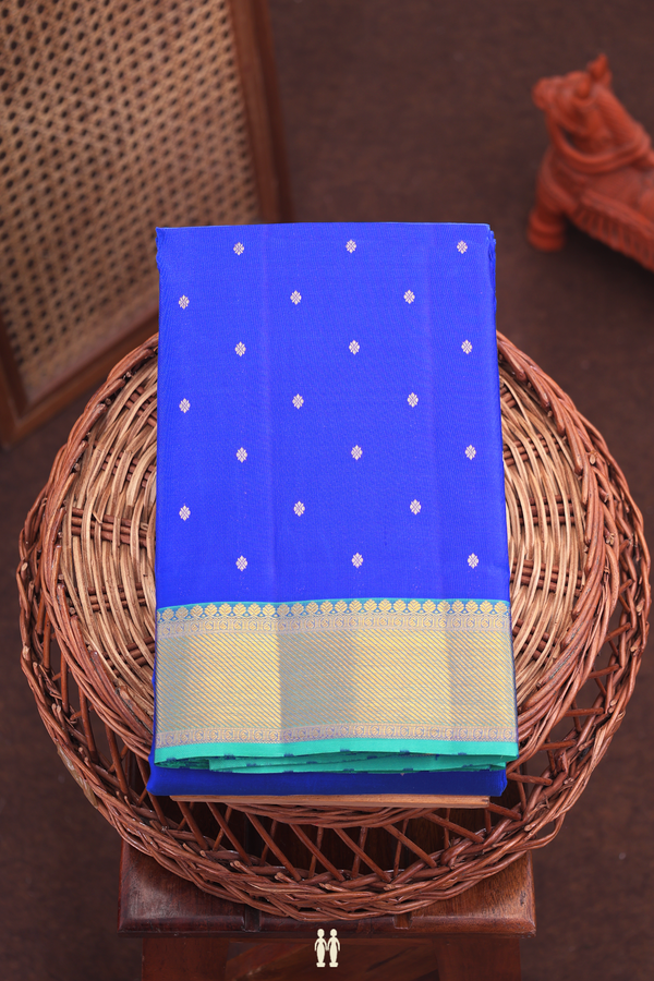 Kanchipuram Silk Saree In Indigo Blue With Floral Buttis