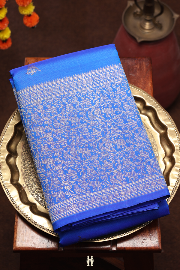 Kanchipuram Silk Saree In Indigo Blue With Parrot Buttas