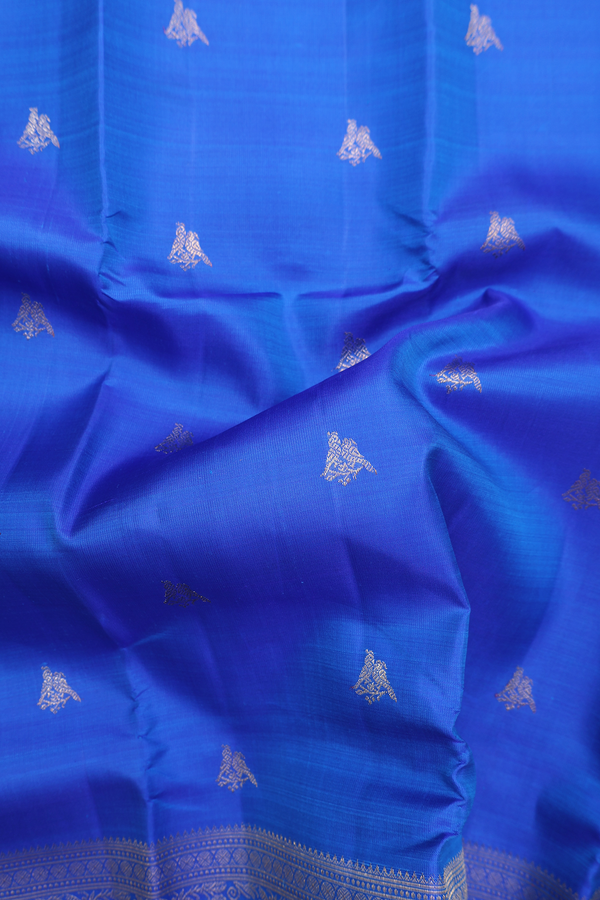 Kanchipuram Silk Saree In Indigo Blue With Parrot Buttas