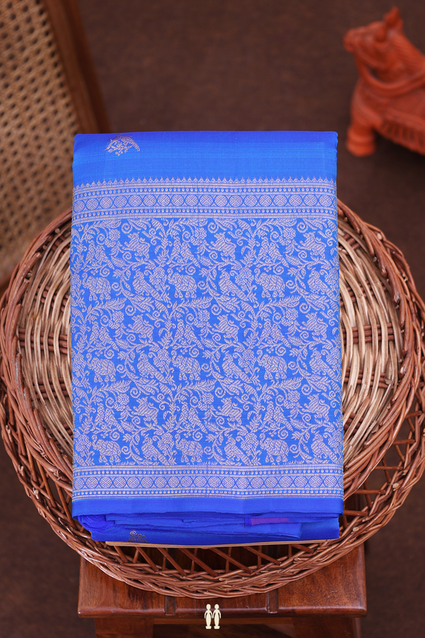 Kanchipuram Silk Saree In Indigo Blue With Peacock Buttas