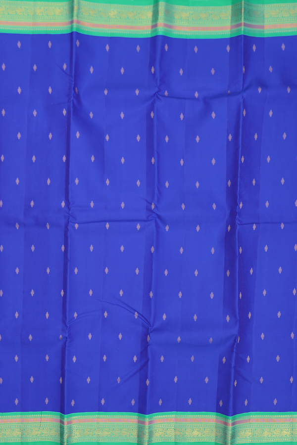Kanchipuram Silk Saree In Indigo Blue With Zari Buttas