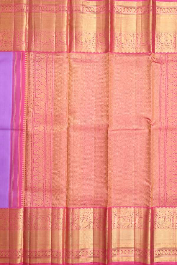 Kanchipuram Silk Saree In Lavender With Peacock Buttas