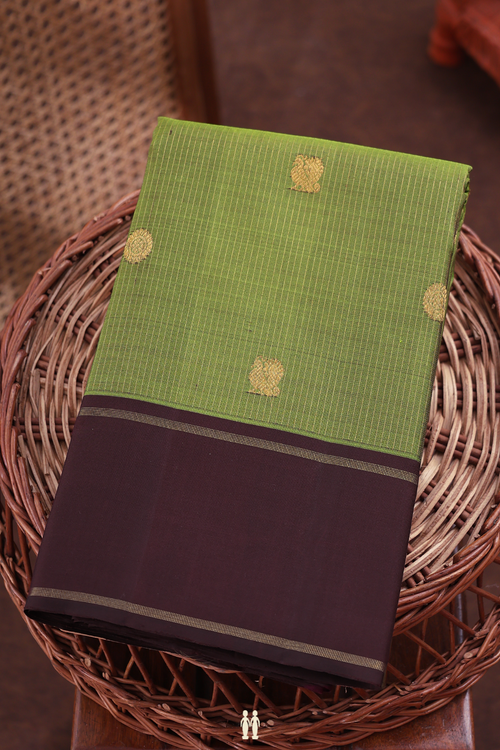 Kanchipuram Silk Saree In Leaf Green Along Stripes With Buttas