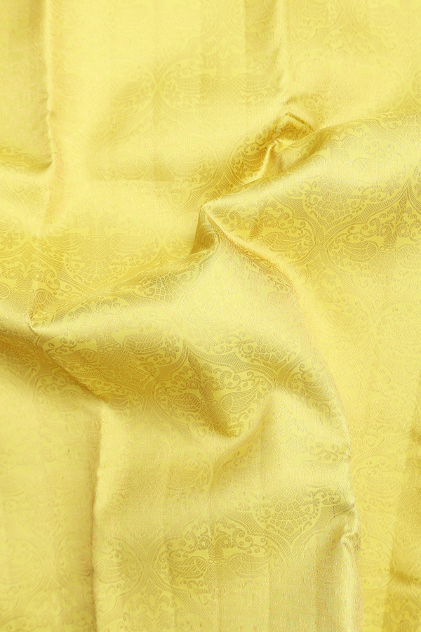Kanchipuram Silk Saree In Lemon Yellow With Iruthalai Pakshi