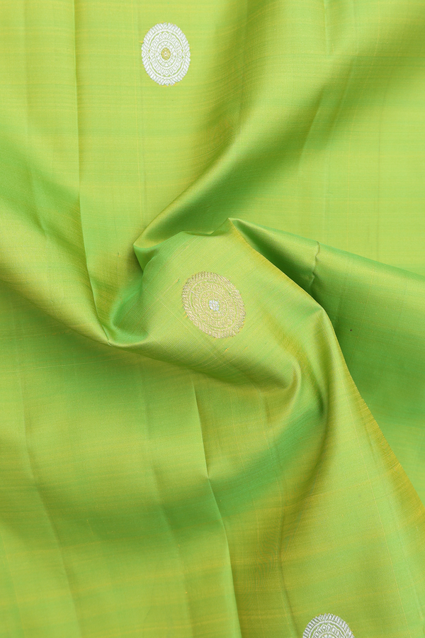Kanchipuram Silk Saree In Lime Green With Chakram Buttas