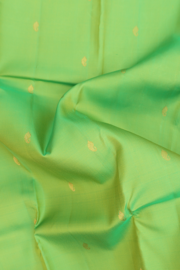 Kanchipuram Silk Saree In Lime Green With Paisley Buttas