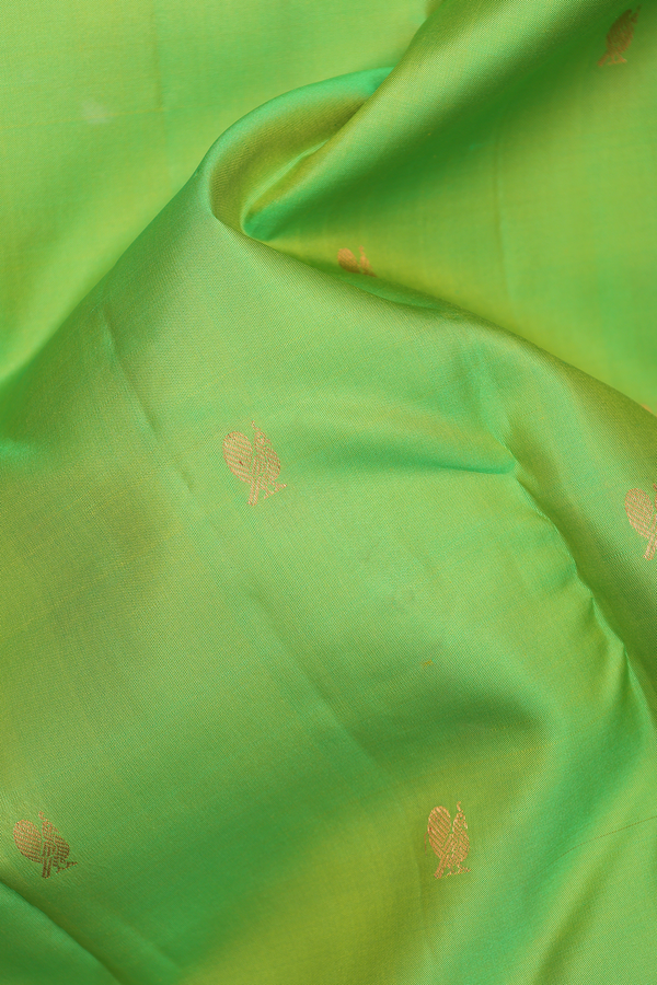 Kanchipuram Silk Saree In Lime Green With Peacock Buttas