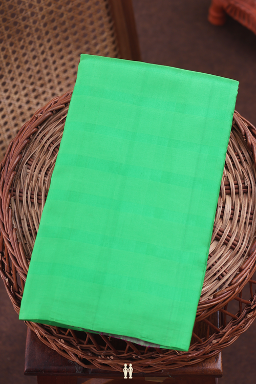 Kanchipuram Silk Saree In Lime Green With Self Stripes Design
