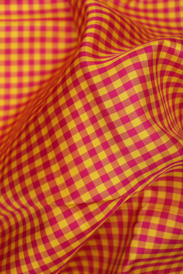 Kanchipuram Silk Saree In Magenta And Yellow With Checked