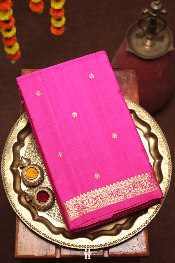 Kanchipuram Silk Saree In Magenta With Floral Buttas