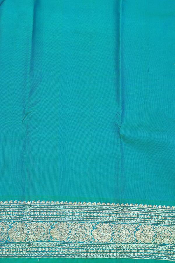 Kanchipuram Silk Saree In Magenta With Peacock Buttas