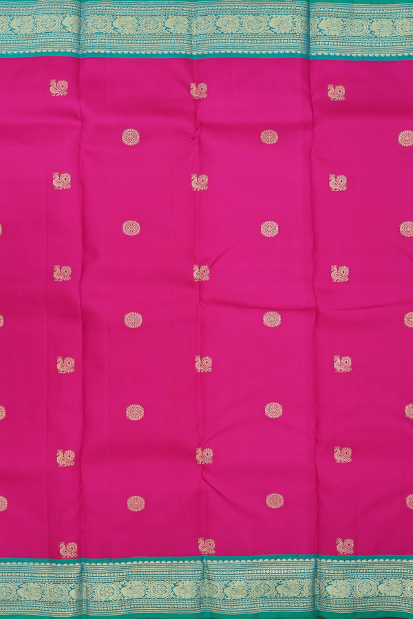 Kanchipuram Silk Saree In Magenta With Peacock Buttas