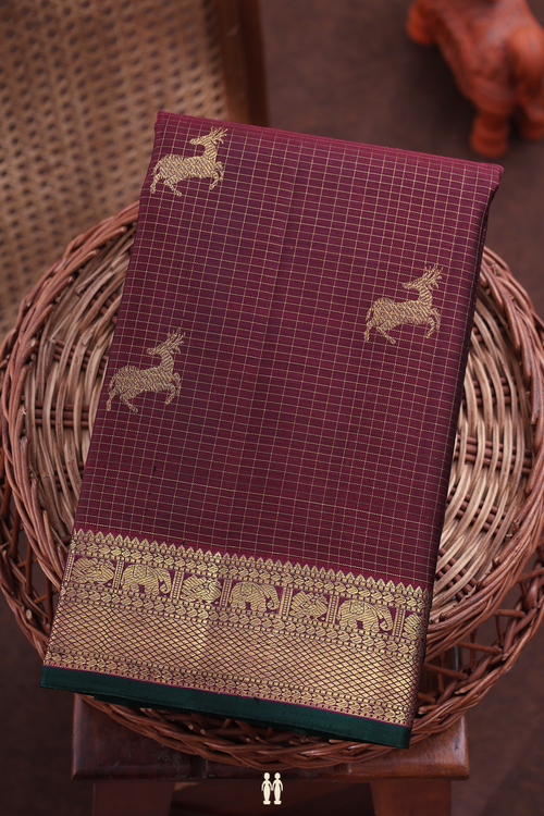 Kanchipuram Silk Saree In Maroon Along Checks With Buttas