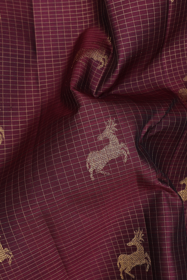 Kanchipuram Silk Saree In Maroon Along Checks With Buttas