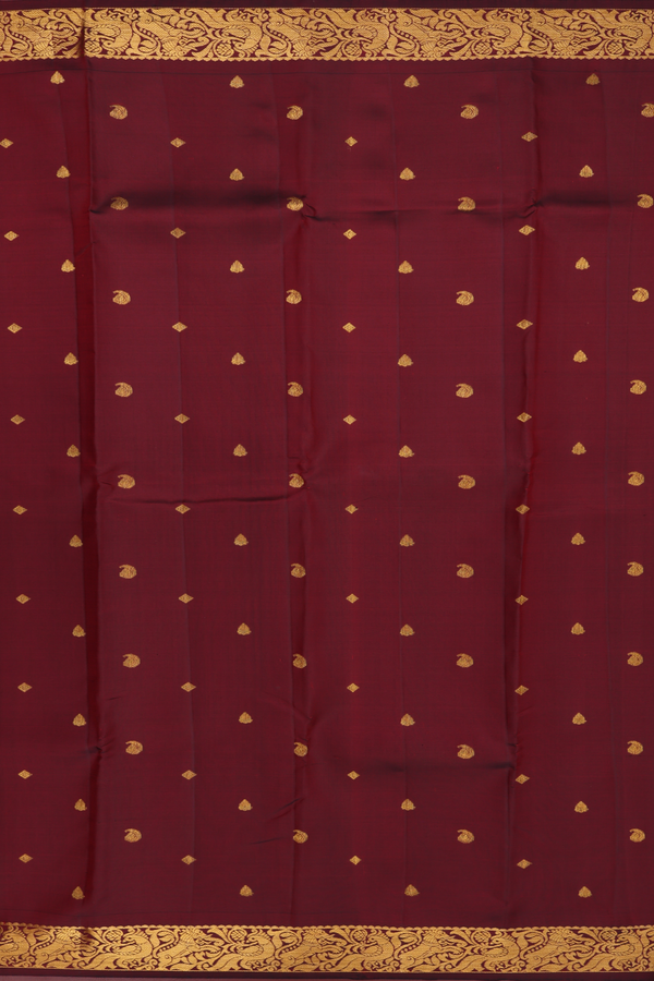 Kanchipuram Silk Saree In Maroon With Paisley Buttas