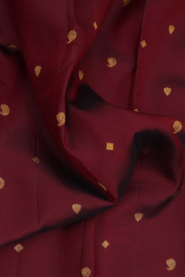Kanchipuram Silk Saree In Maroon With Paisley Buttas
