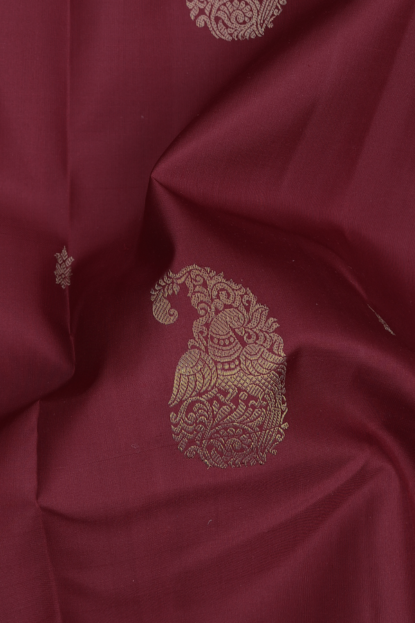 Kanchipuram Silk Saree In Maroon With Paisley Motifs