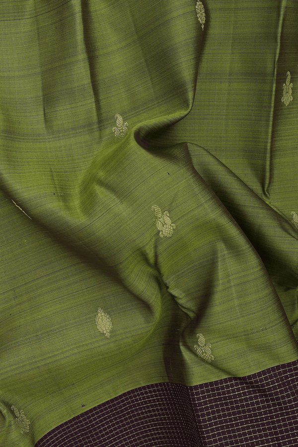 Kanchipuram Silk Saree In Mehendi Green With Zari Buttas