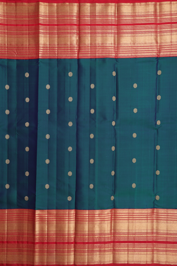 Kanchipuram Silk Saree In Midnight Green With Floral Buttas