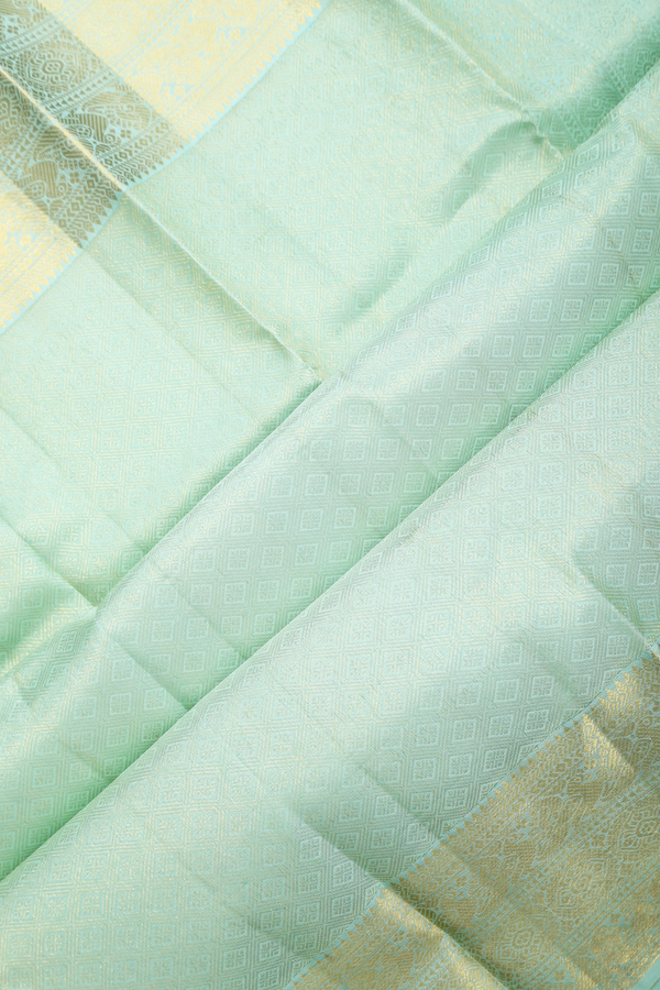 Kanchipuram Silk Saree In Mint Green Checks With Buttas