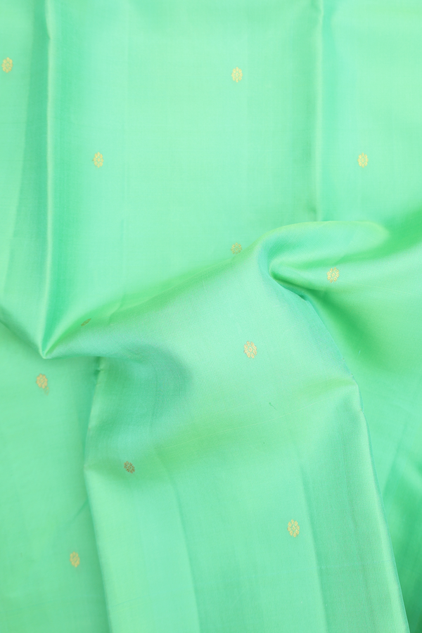 Kanchipuram Silk Saree In Mint Green With Floral Buttis