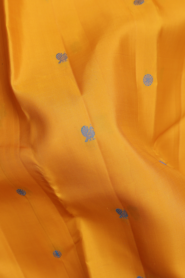 Kanchipuram Silk Saree In Mustard Yellow With Peacock Buttas