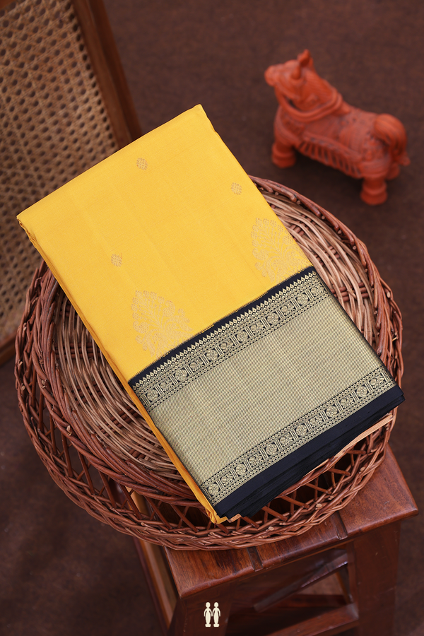 Kanchipuram Silk Saree In Mustard Yellow With Floral Buttas
