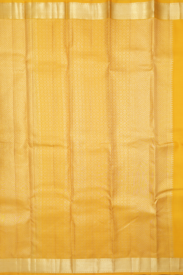Kanchipuram Silk Saree In Mustard Yellow With Peacock Buttas