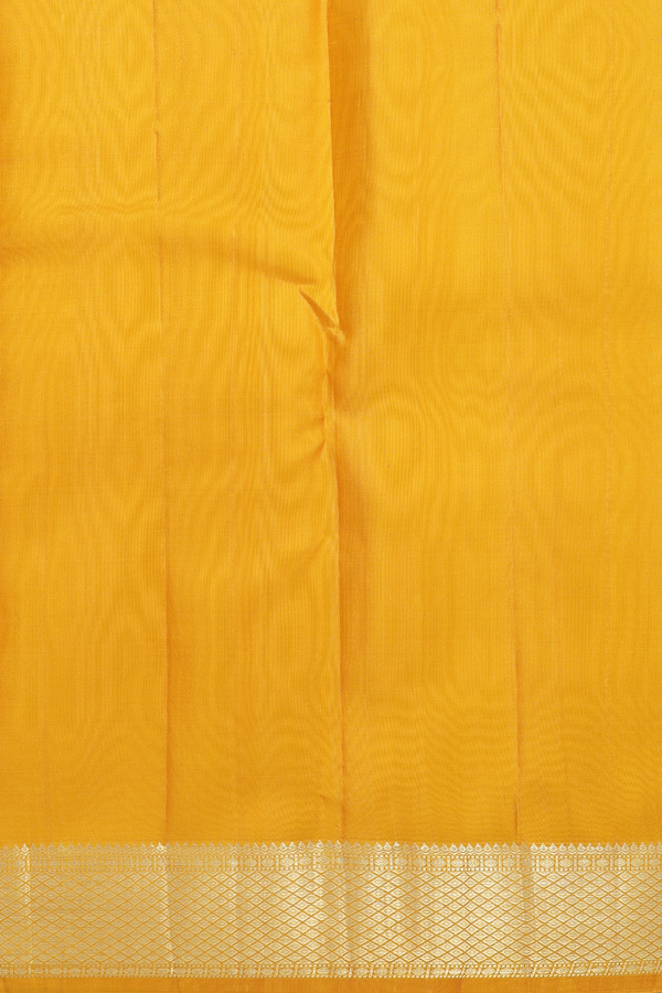 Kanchipuram Silk Saree In Mustard Yellow With Peacock Buttas