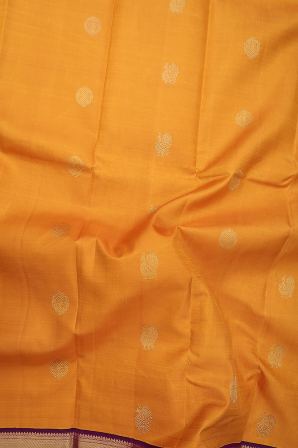 Kanchipuram Silk Saree In Mustard Yellow With Peacock Buttas