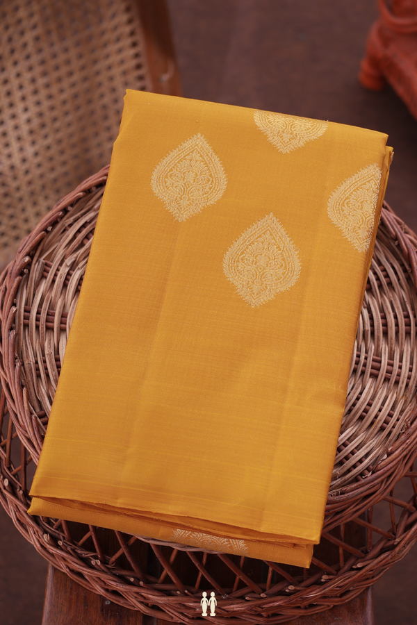 Kanchipuram Silk Saree In Mustard Yellow With Zari Buttas