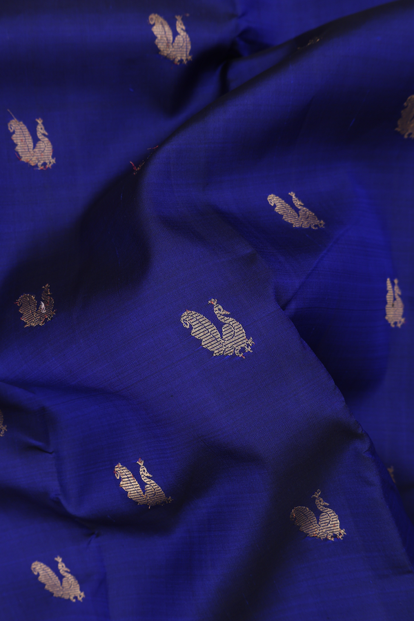 Kanchipuram Silk Saree In Navy Blue With Peacock Buttas