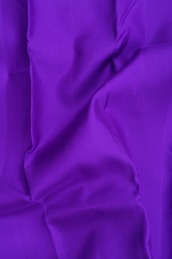 Kanchipuram Silk Saree In Purple With Temple Border