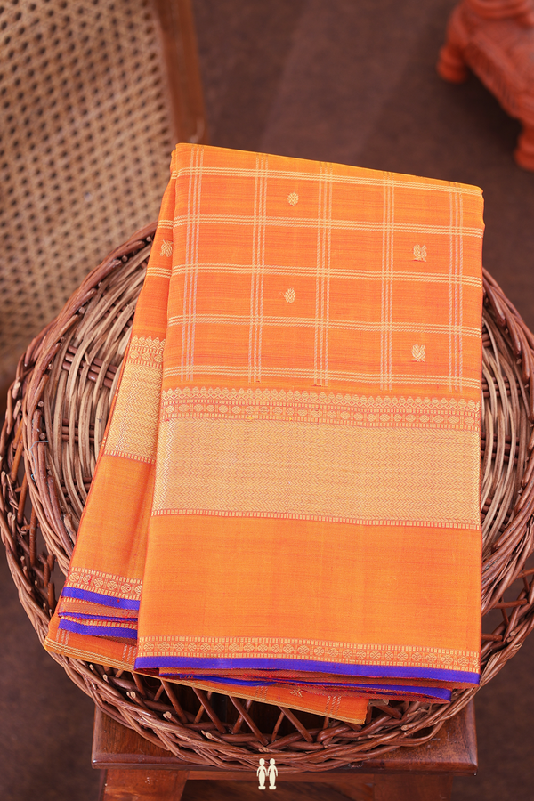 Kanchipuram Silk Saree In Ochre Orange With Checks Along Buttas