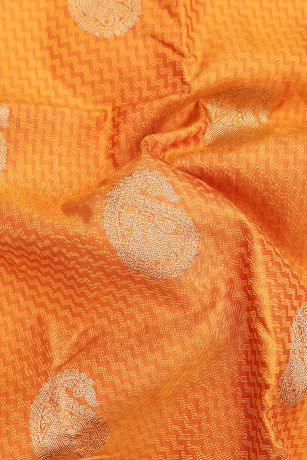 Kanchipuram Silk Saree In Ochre Orange With Paisley Design