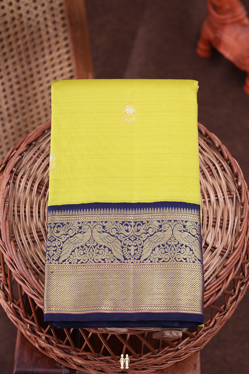 Kanchipuram Silk Saree In Olive Yellow With Floral Buttas