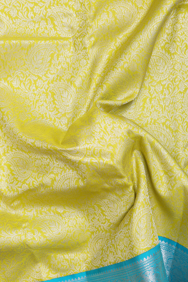 Kanchipuram Silk Saree In Olive Yellow With Paisley Design