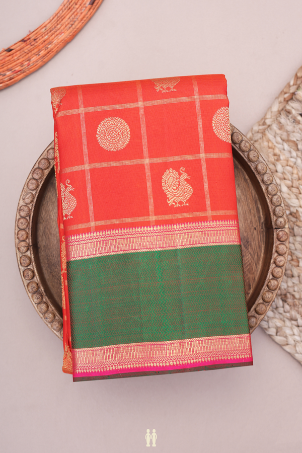 Kanchipuram Silk Saree In Orange Along Checks With Buttas