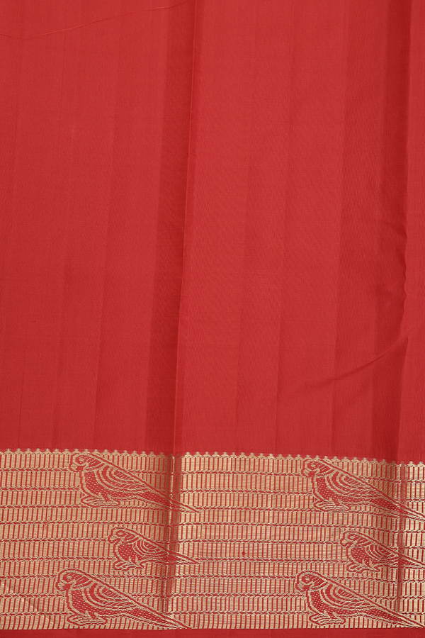 Kanchipuram Silk Saree In Orange Along Checks With Buttas
