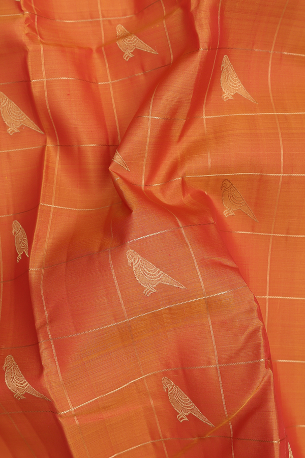 Kanchipuram Silk Saree In Orange Along Checks With Buttas