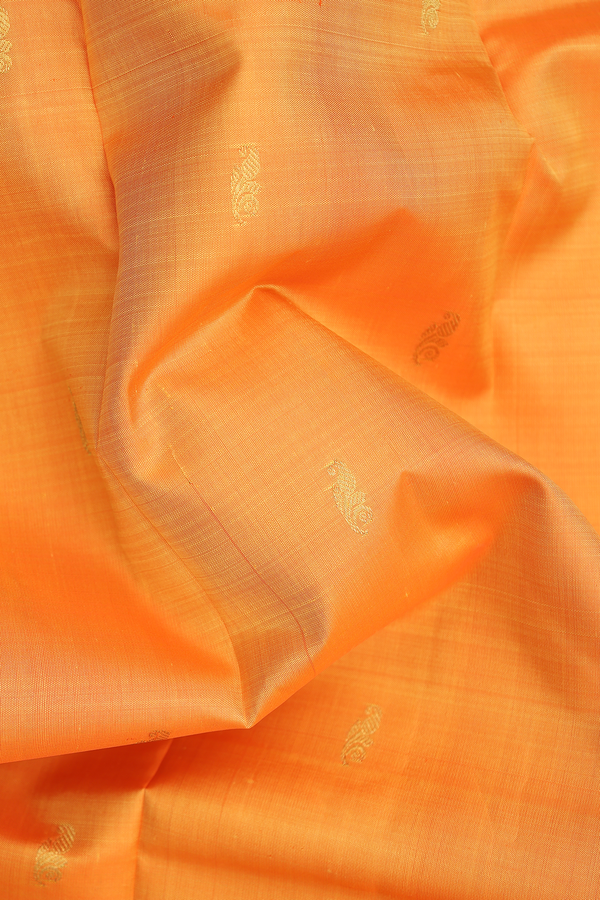 Kanchipuram Silk Saree In Orange With Floral Buttas