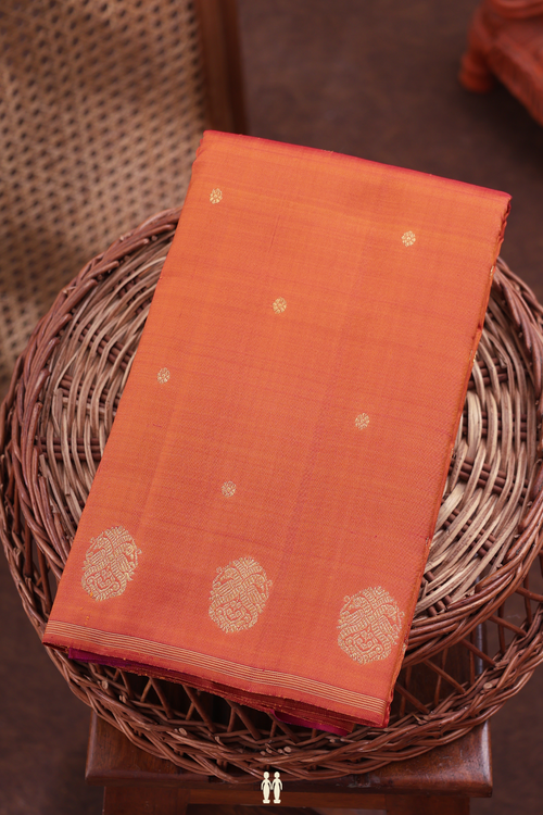 Kanchipuram Silk Saree In Orange With Floral Buttis