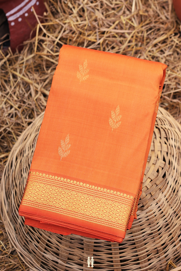Kanchipuram Silk Saree In Orange With Leaf Buttas