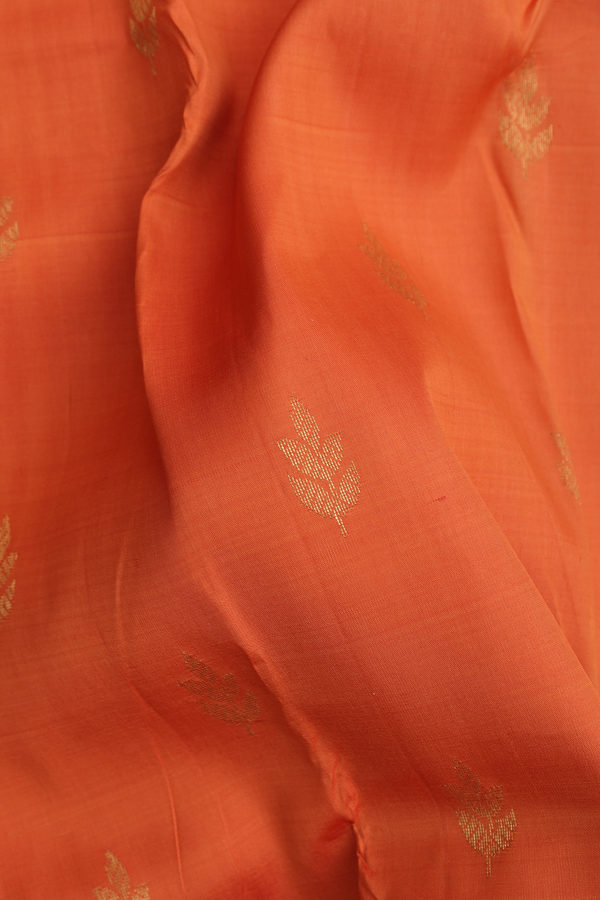 Kanchipuram Silk Saree In Orange With Leaf Buttas
