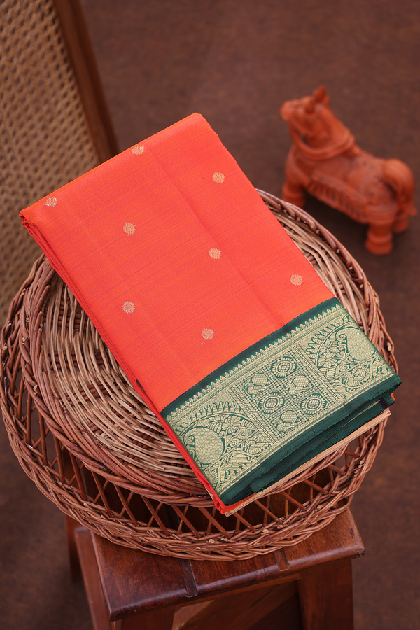 Kanchipuram Silk Saree In Orange With Zari Buttas