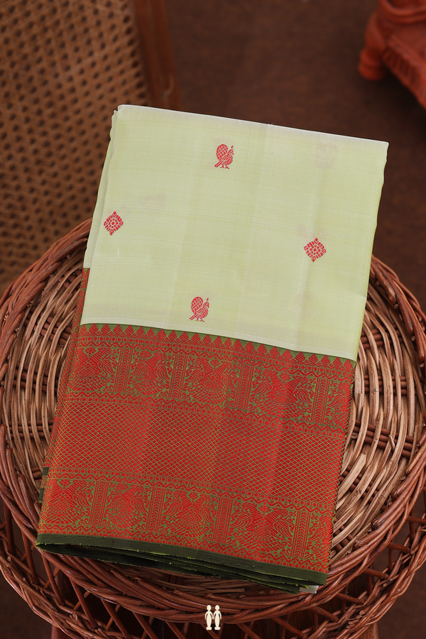 Kanchipuram Silk Saree In Pale Green With Peacock Buttas