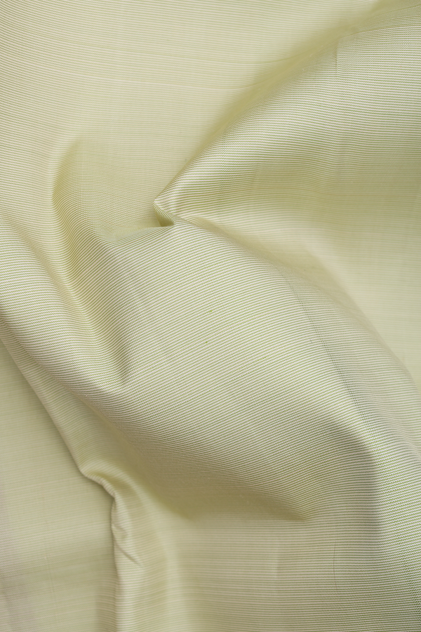 Kanchipuram Silk Saree In Pale Green With Stripes Design