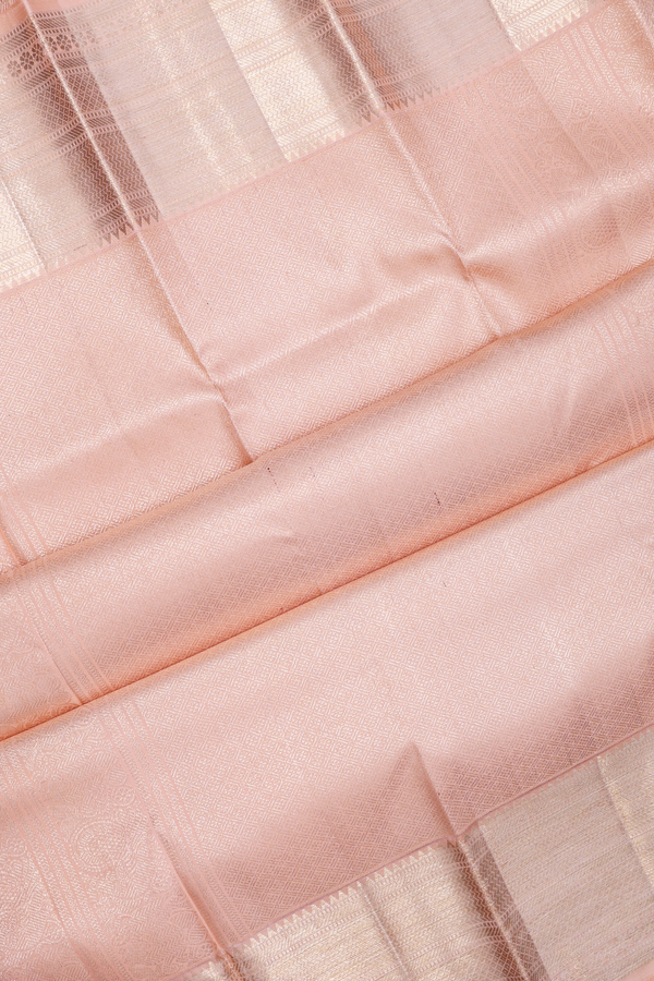 Kanchipuram Silk Saree In Pale Orange With Paisley Design