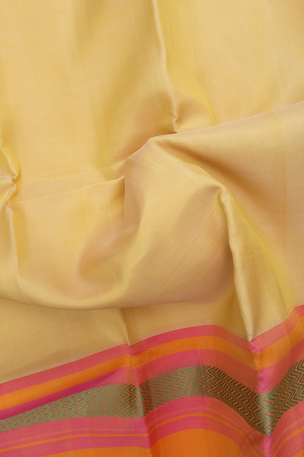 Kanchipuram Silk Saree In Pale Yellow With Contrast Border